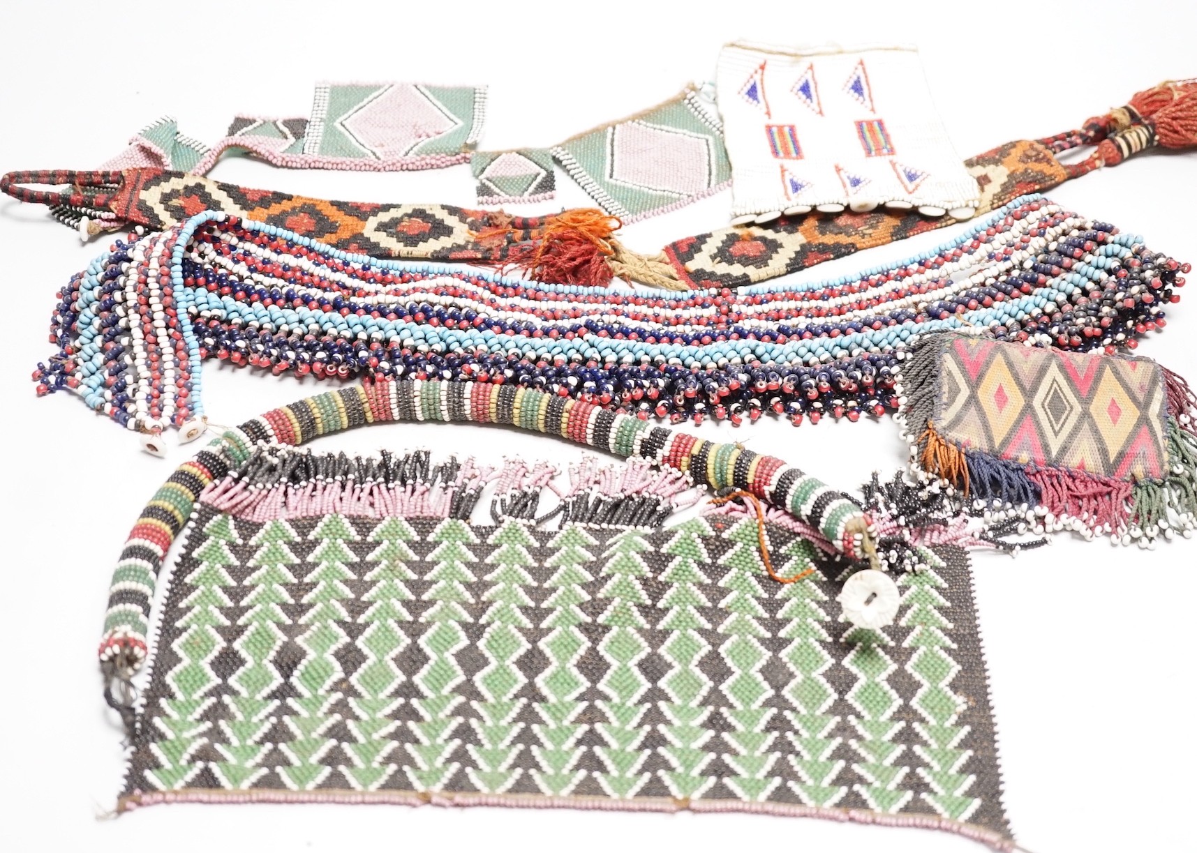 A selection of tribal geometric beadwork, to include a waistband believed to be Zulu